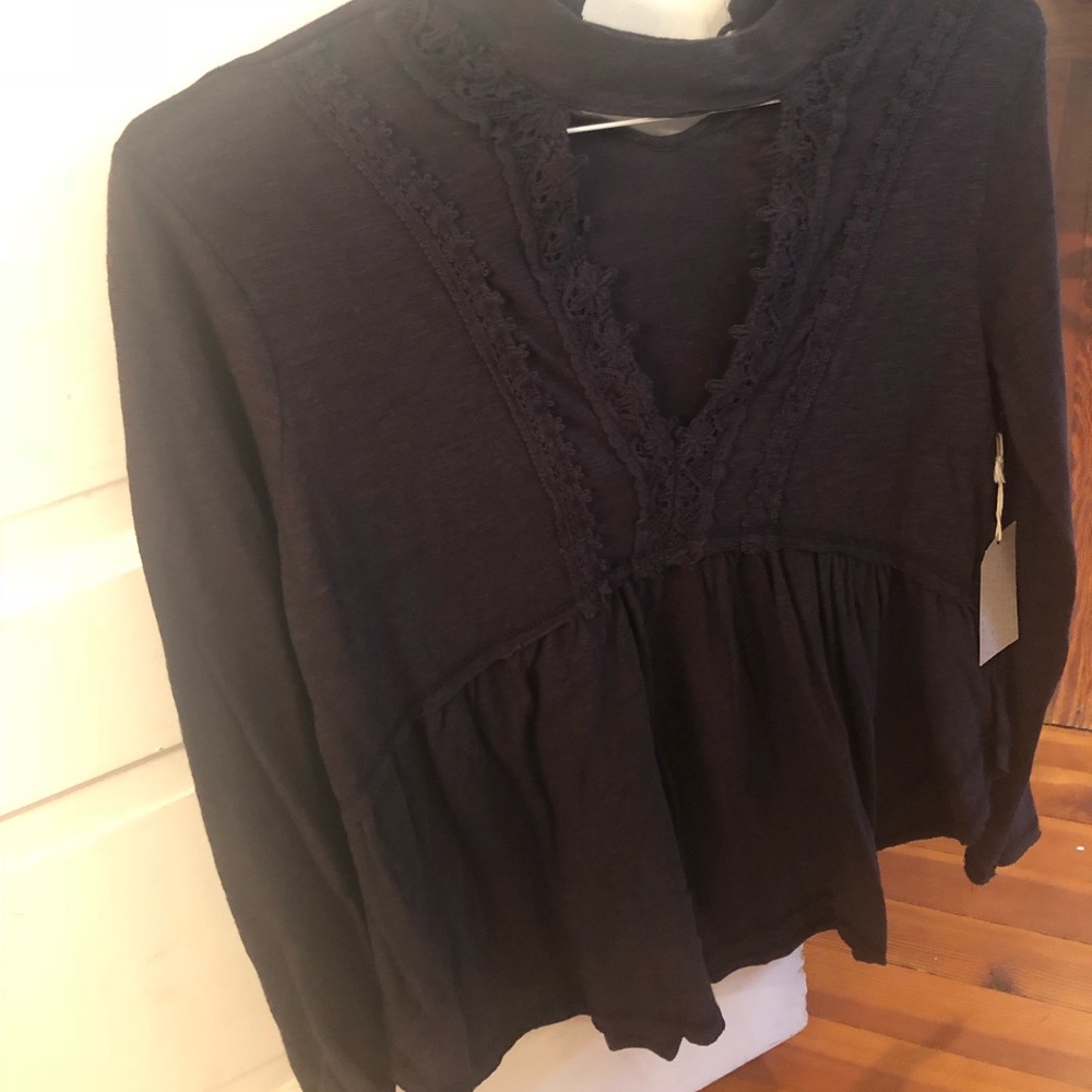 Black top with cut out in the middle!